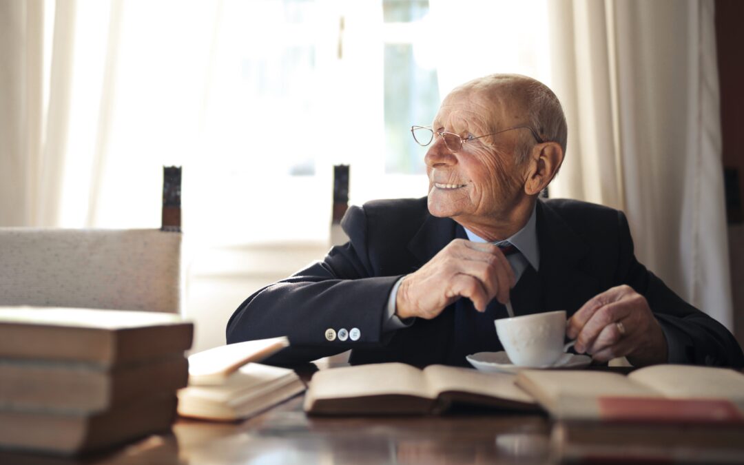 Old Man Reading and Drinking Coffee