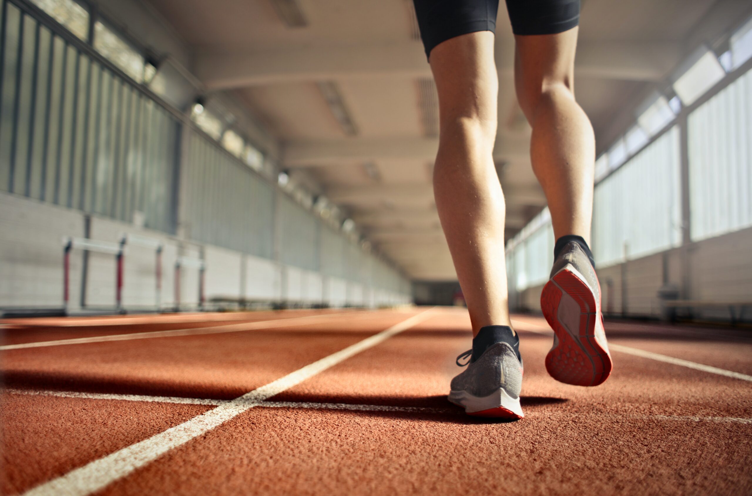 person running on track