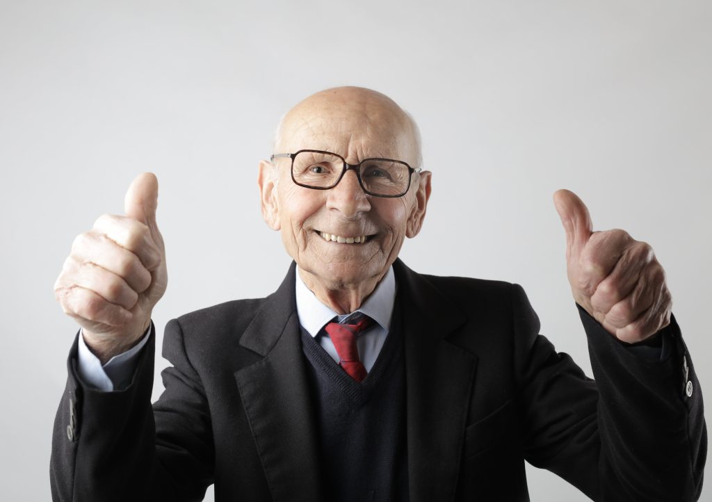 Older man with thumbs up