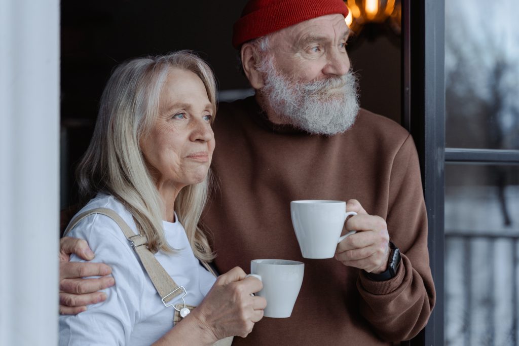 Elderly individuals outside in the sun